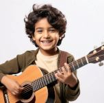 Kid Playing Guitar
