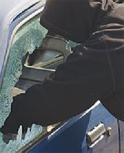 Guy Breaking Into Automobile